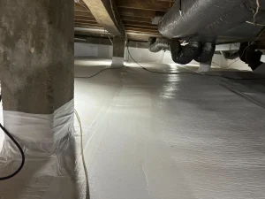 Professional crawlspace waterproofing with a sealed vapor barrier and encapsulation system to prevent moisture, mold, and foundation damage.