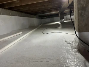 Crawlspace waterproofing and encapsulation system with sealed vapor barrier protecting the area from moisture